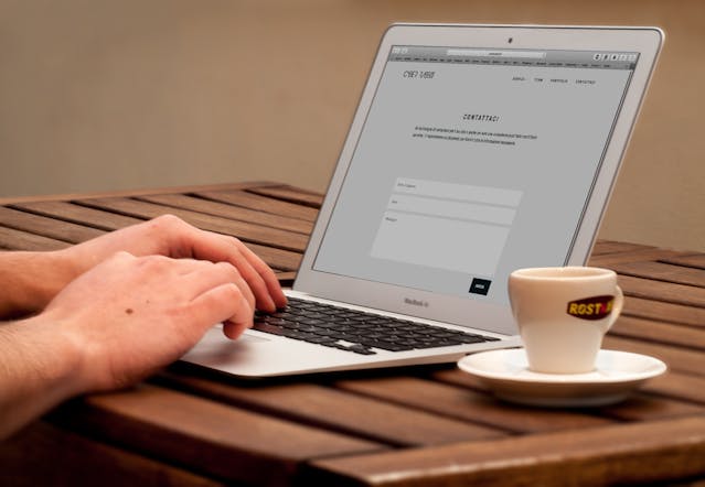 working on the computer for website localization